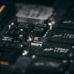Detailed macro shot of electronic circuit components showcasing intricate design and layout.