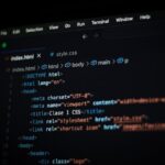 Close-up of HTML code displayed on a computer screen in dark mode, focusing on programming concepts.