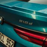 Close view of a blue BMW 216d with license plate in Istanbul, Türkiye.