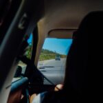A scenic drive captured from inside a car, illustrating the journey and landscape.