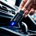 BMW OBD2 포트에 어댑터 연결하는 모습