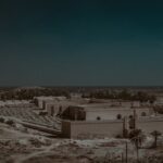 Explore the historic ruins of ancient Babylon under the expansive Iraqi sky.