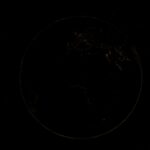 A breathtaking aerial view of Earth at night showcasing city lights across continents.
